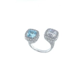 Anillo Aura Plata abierto con dos piedras cuadradas  azul y en blanco.RI004811